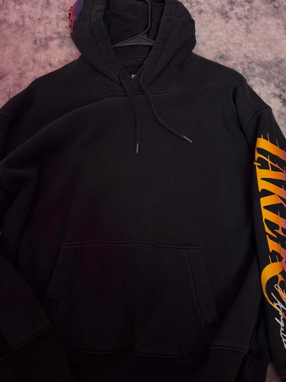 Hollister Black Hoodie with Yellow-Orange Sleeve Graphic